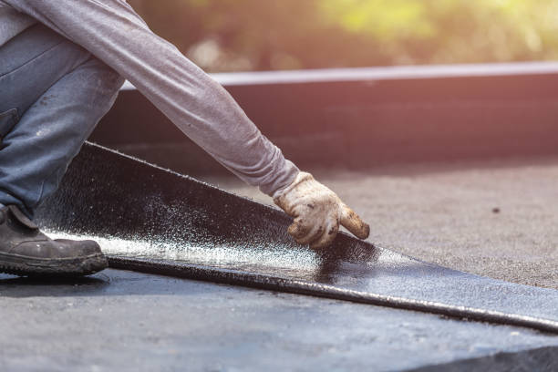 Professional Exterior Waterproofing technician working in Lumberton, NC